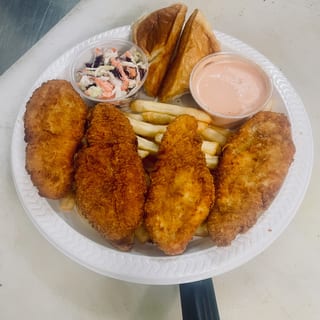 4pc Chicken Strips Combo — 4 strips; 1 sauce selections; 1 dinner roll; coleslaw portion; 1 chosen side; 1 chosen drink