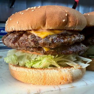 Double Cheeseburger Combo — 2 quarter-pound patties; 2 cheese slices; 1 chosen side; 1 chosen drink